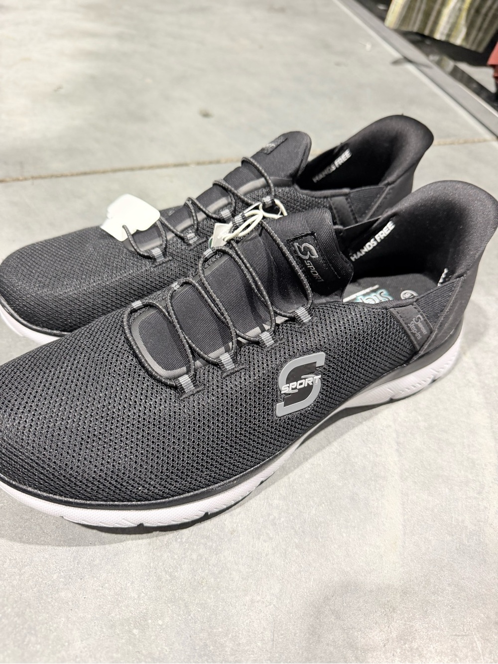 Skechers Black and White Slip-On Athletic Sneakers
